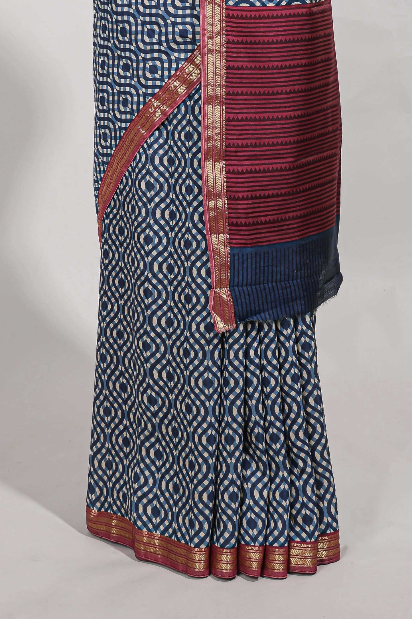navy blue geometric print  assam silk saree with  zari border and matching blouse