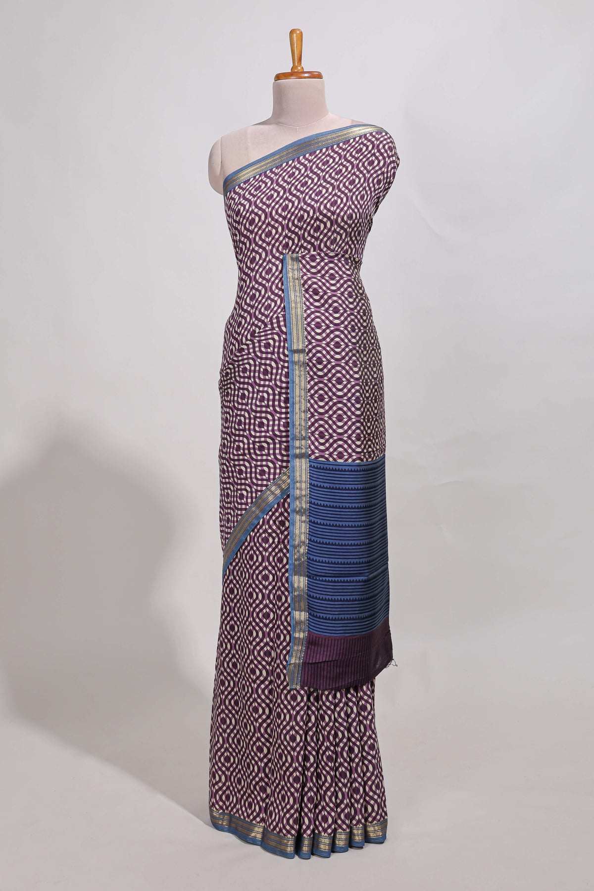 Violet geometric print  assam silk saree with  zari border and matching blouse