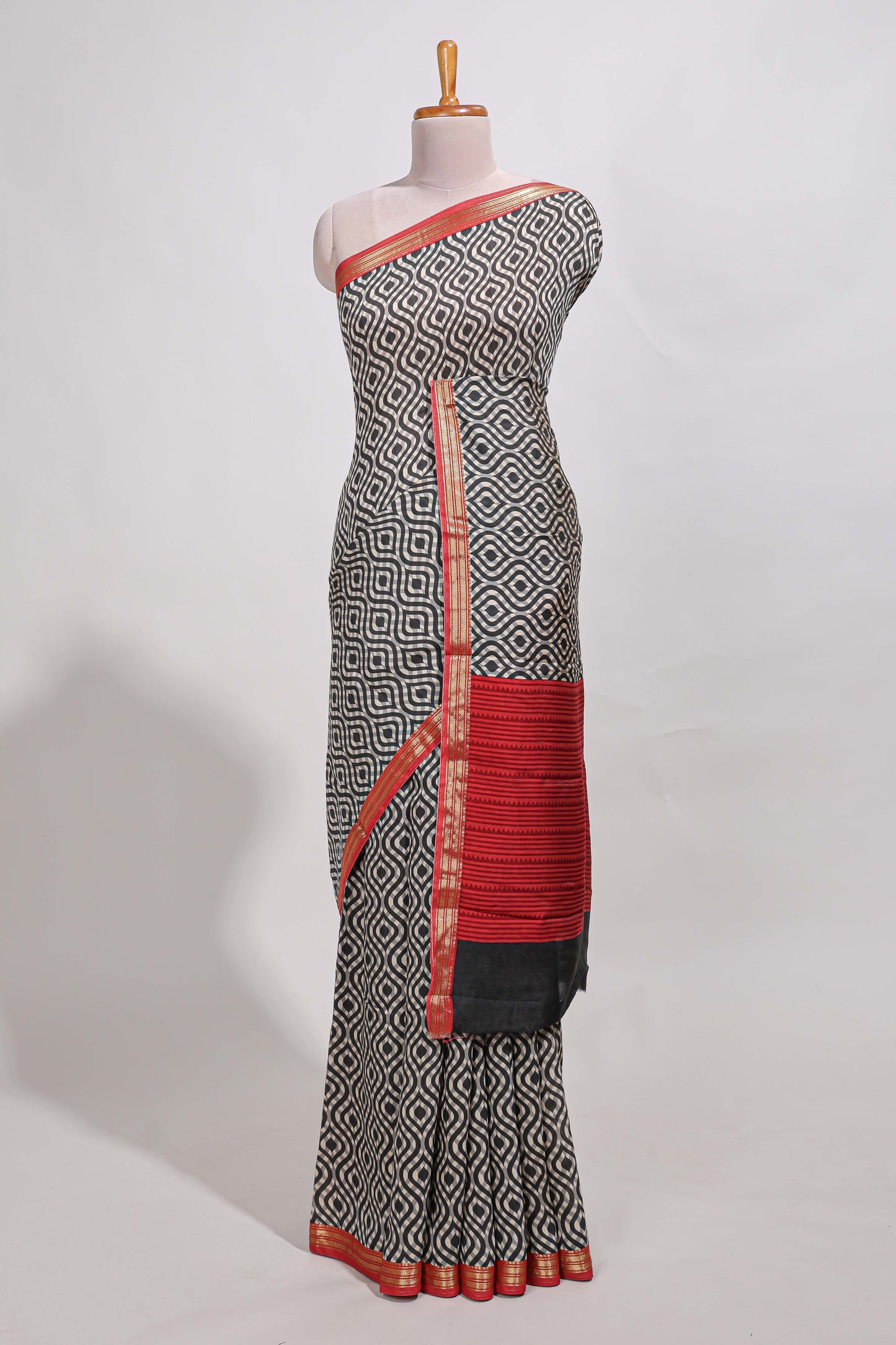 Grey geometric print  assam silk saree with  zari border and matching blouse