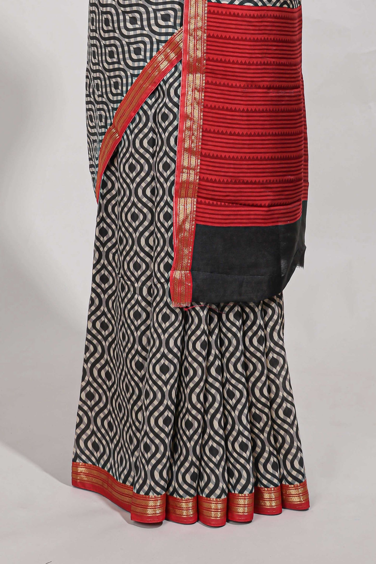 Grey geometric print  assam silk saree with  zari border and matching blouse