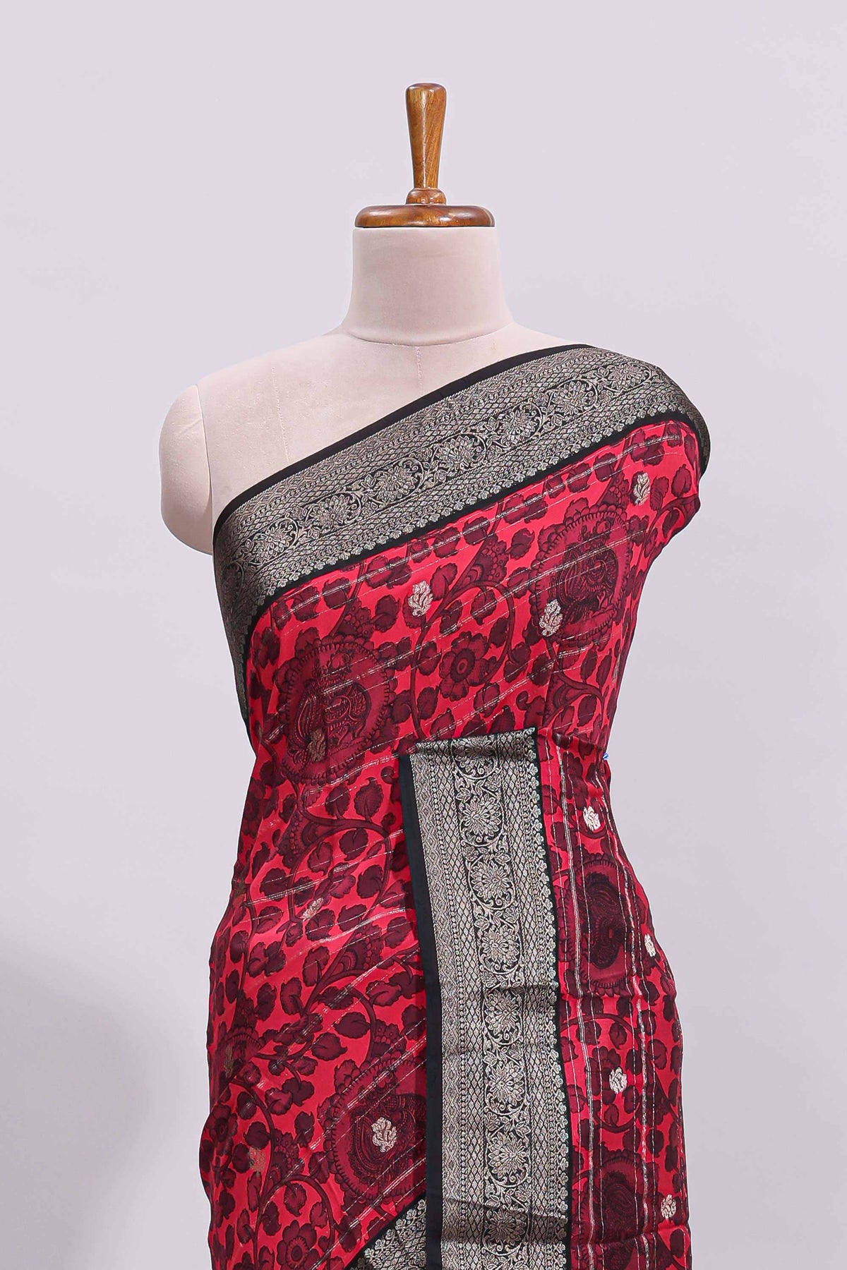 Pink floral design zari motifs assam silk saree with contrast zari border matching striped blouse