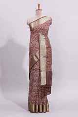 Beige checked floral design assam silk saree with contrast zari border and printed blouse