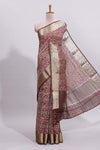 Beige checked floral design assam silk saree with contrast zari border and printed blouse