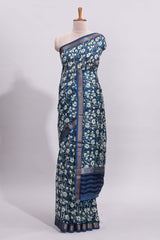 Blue floral design assam silk saree with self zari border and striped blouse