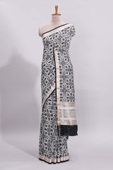 White ikkat style floral design assam silk saree with contrast zari border and motifs blouse
