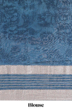 White floral design assam silk saree with contrast zari border and printed blouse