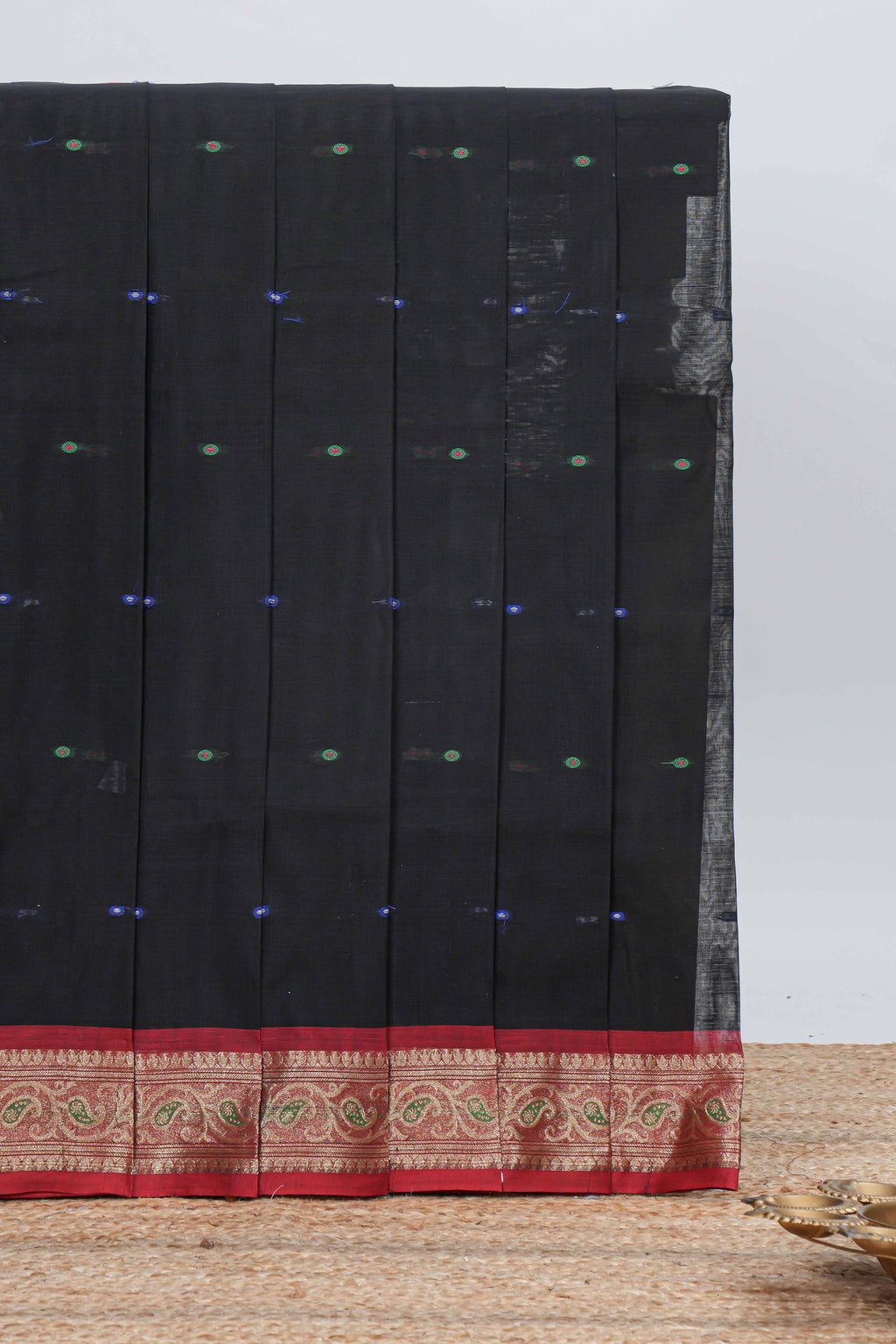 Black colour bengal cotton saree with all over thread buttas contrast bentex border and contrast pallu along with blouse piece