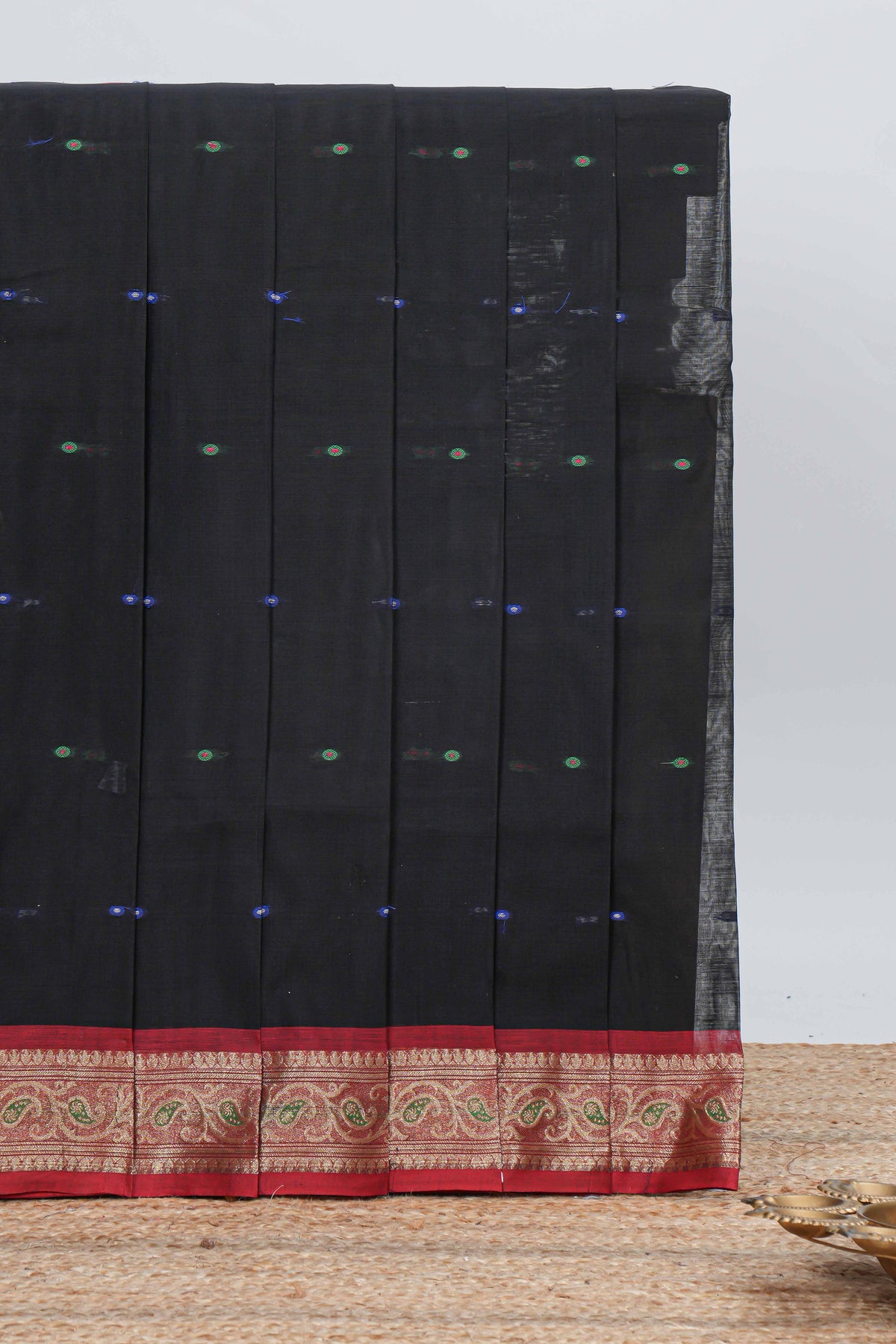Black colour bengal cotton saree with all over thread buttas contrast bentex border and contrast pallu along with blouse piece
