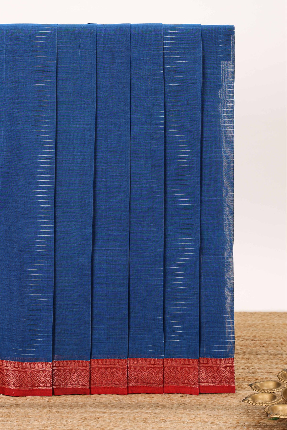Blue plain bengal cotton saree with contrast border and pallu