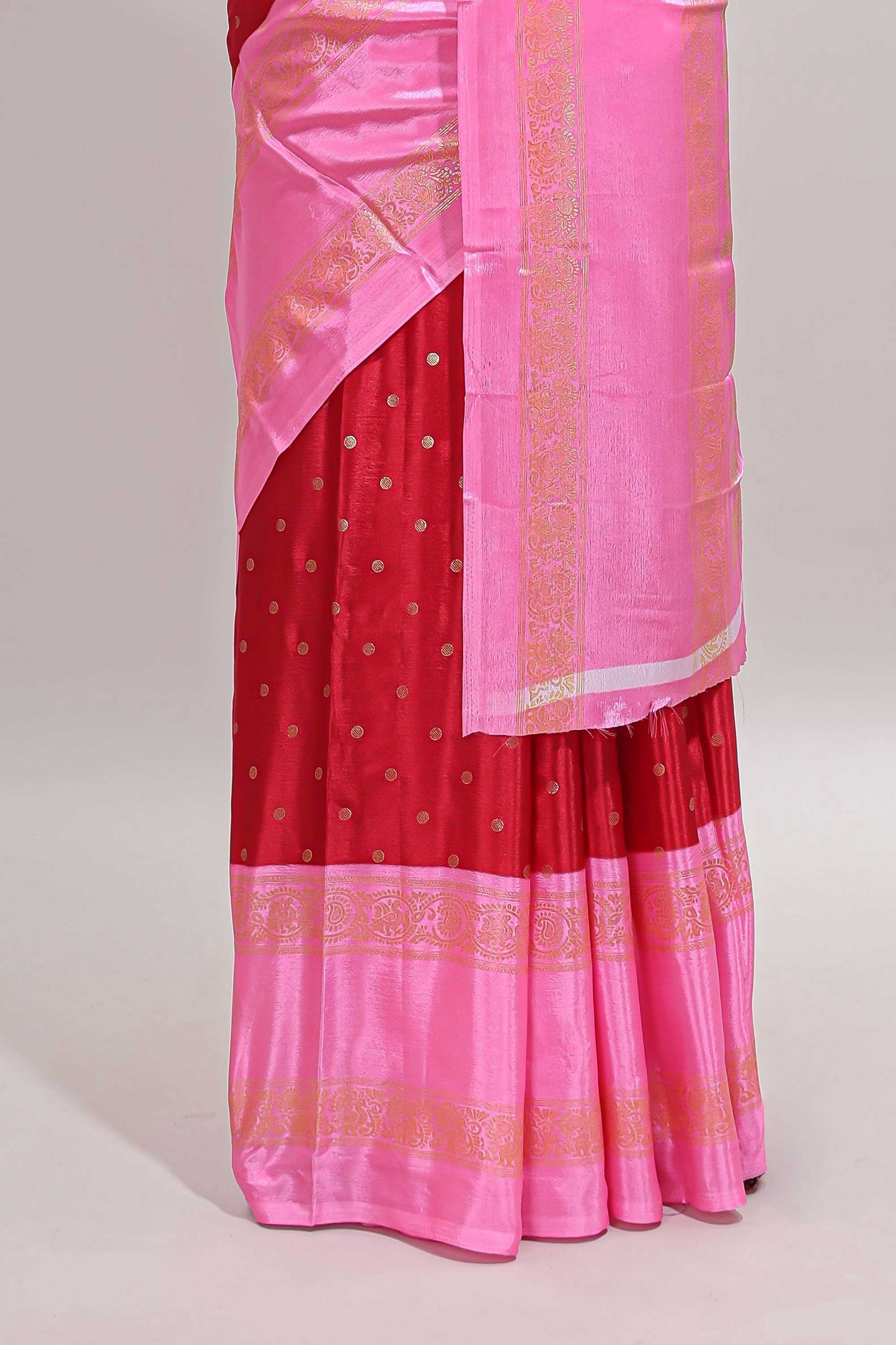 Red zari butta semi soft silk saree with contrast bentex border and zari striped pallu