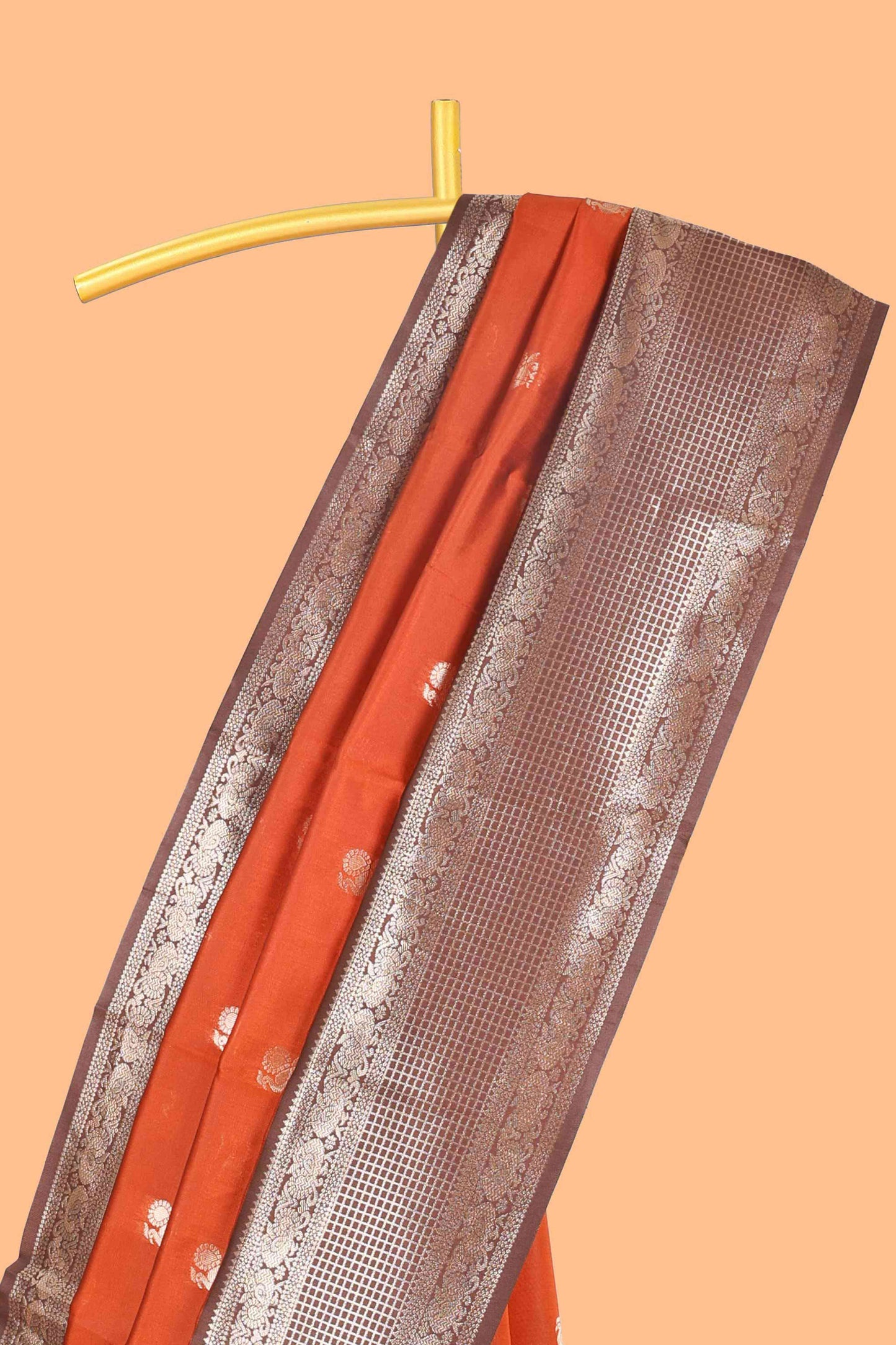 Rust orange peacock zari motifs design semi soft silk saree with contrast zari border and pallu