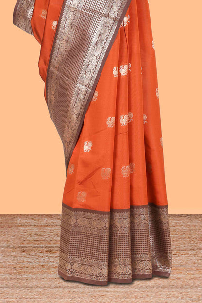 Rust orange peacock zari motifs design semi soft silk saree with contrast zari border and pallu