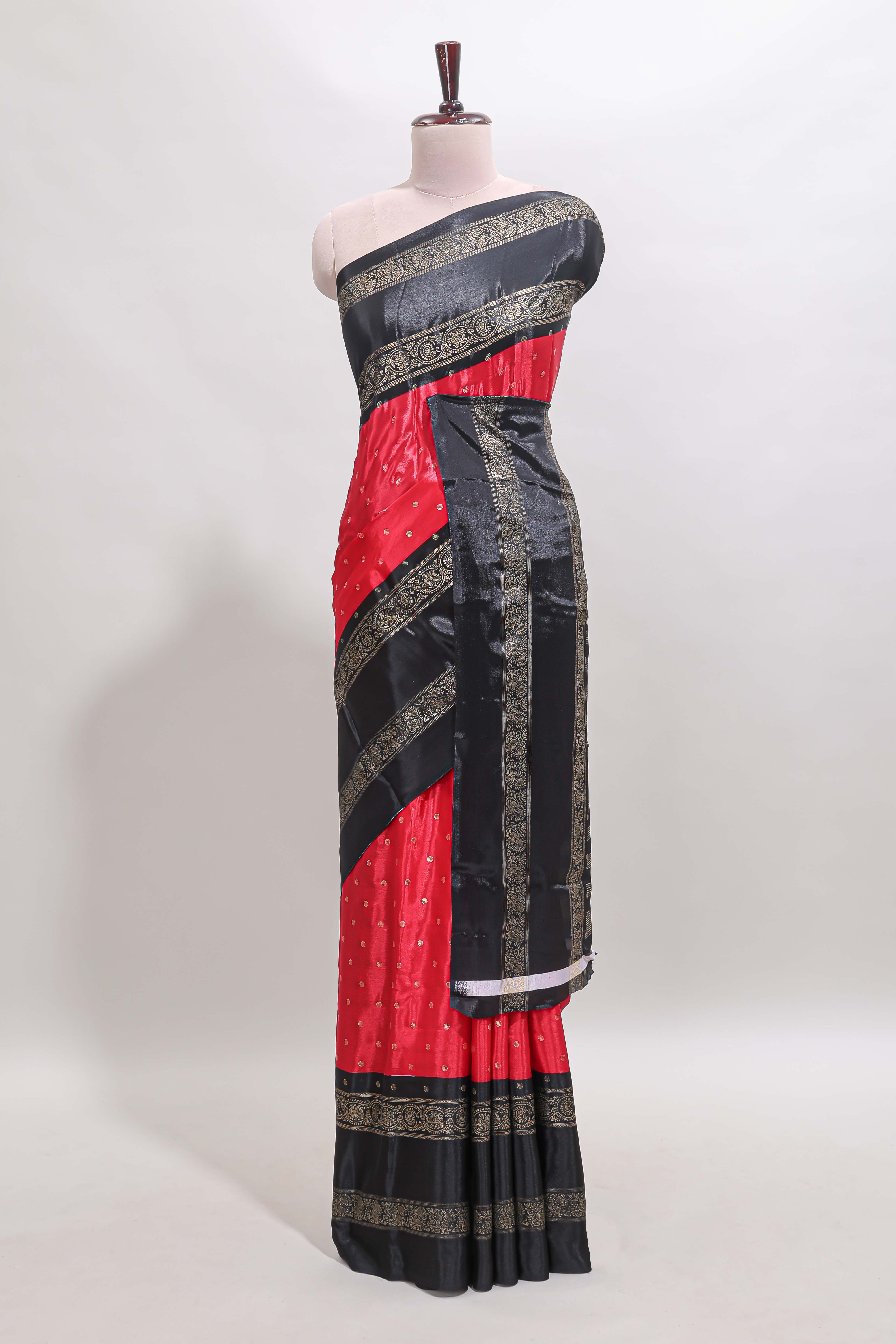 Red zari butta semi soft silk saree with contrast black bentex border and zari striped pallu