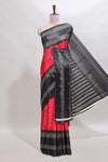 Red zari butta semi soft silk saree with contrast black bentex border and zari striped pallu