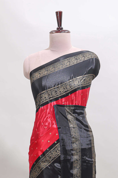 Red zari butta semi soft silk saree with contrast black bentex border and zari striped pallu