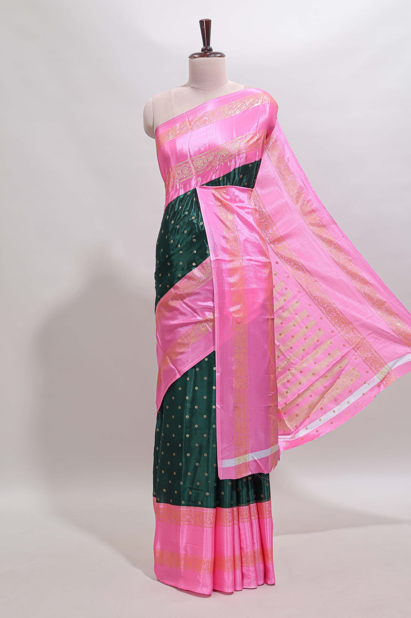 Bottel green zari butta semi soft silk saree with contrast bentex border and zari striped pallu