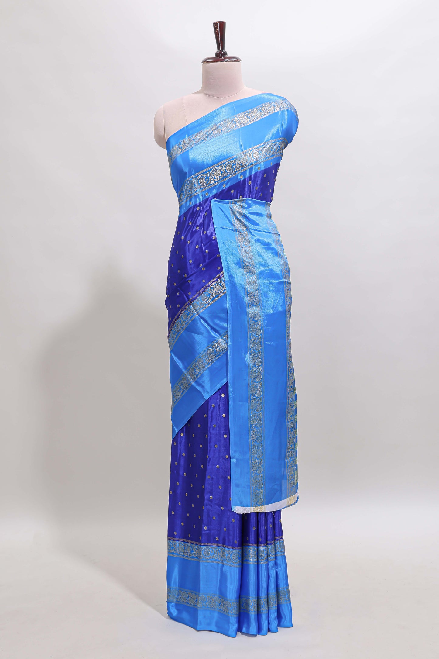 Blue zari butta semi soft silk saree with contrast bentex border and zari striped pallu