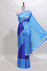 Blue zari butta semi soft silk saree with contrast bentex border and zari striped pallu