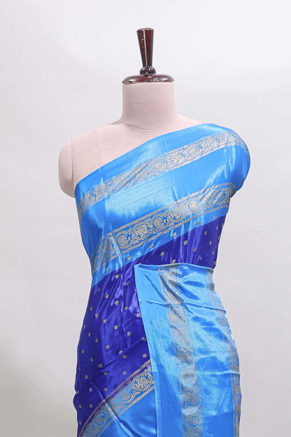 Blue zari butta semi soft silk saree with contrast bentex border and zari striped pallu
