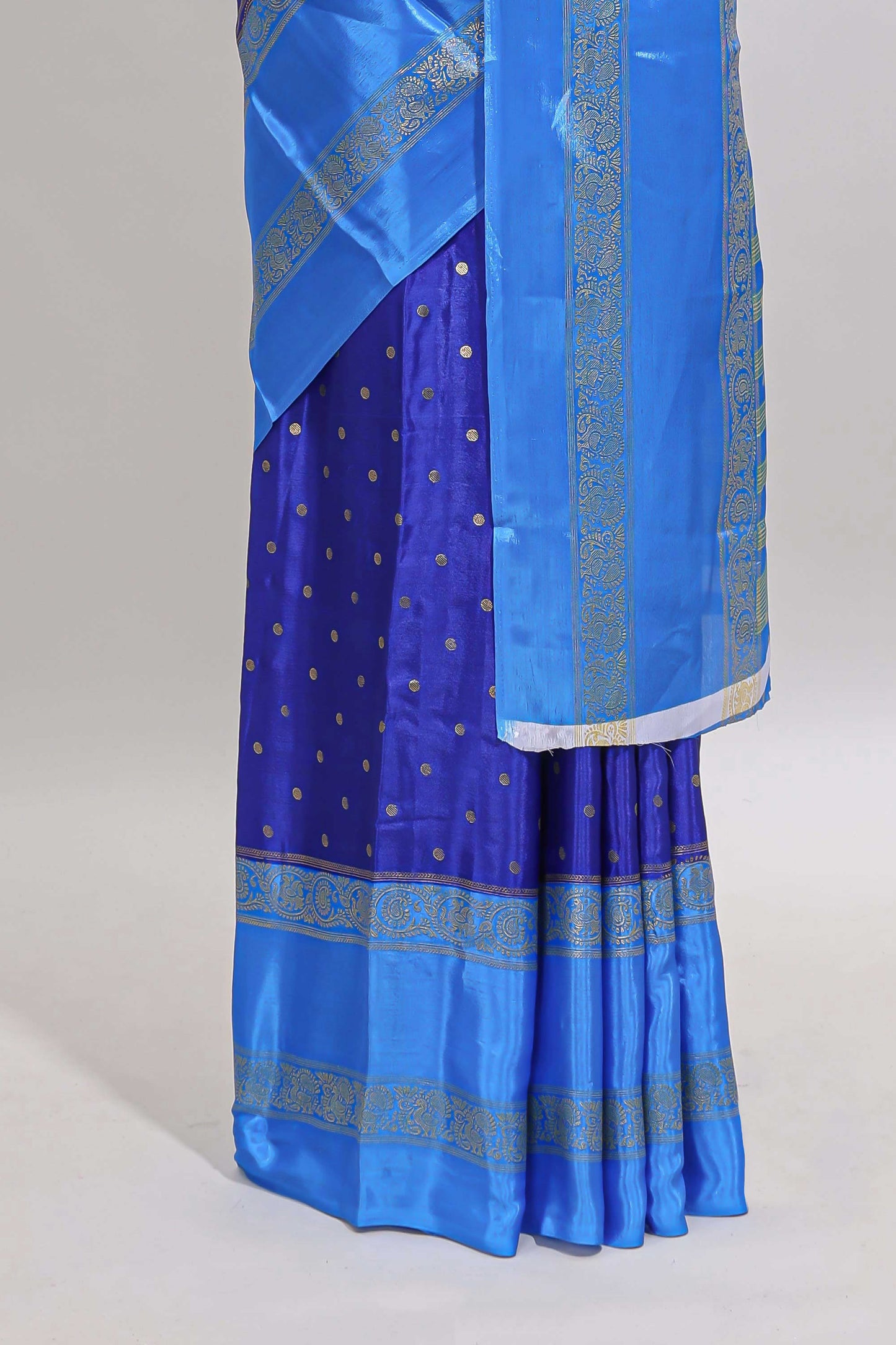 Blue zari butta semi soft silk saree with contrast bentex border and zari striped pallu