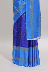 Blue zari butta semi soft silk saree with contrast bentex border and zari striped pallu