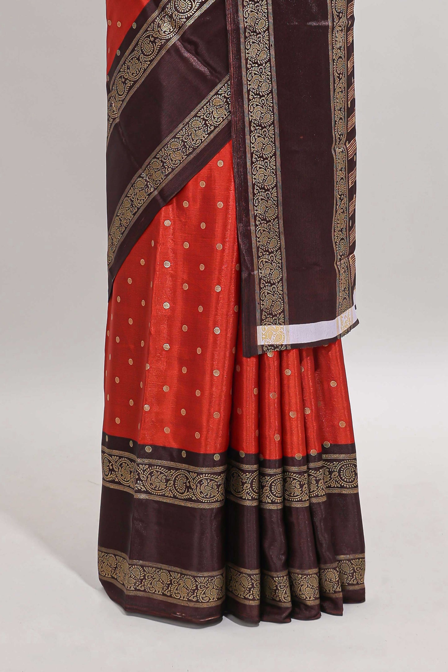 Deep orange zari butta semi soft silk saree with contrast bentex border and zari striped pallu