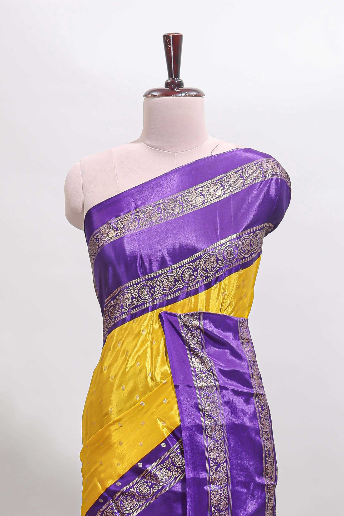Yellow zari butta semi soft silk saree with contrast bentex border and zari striped pallu