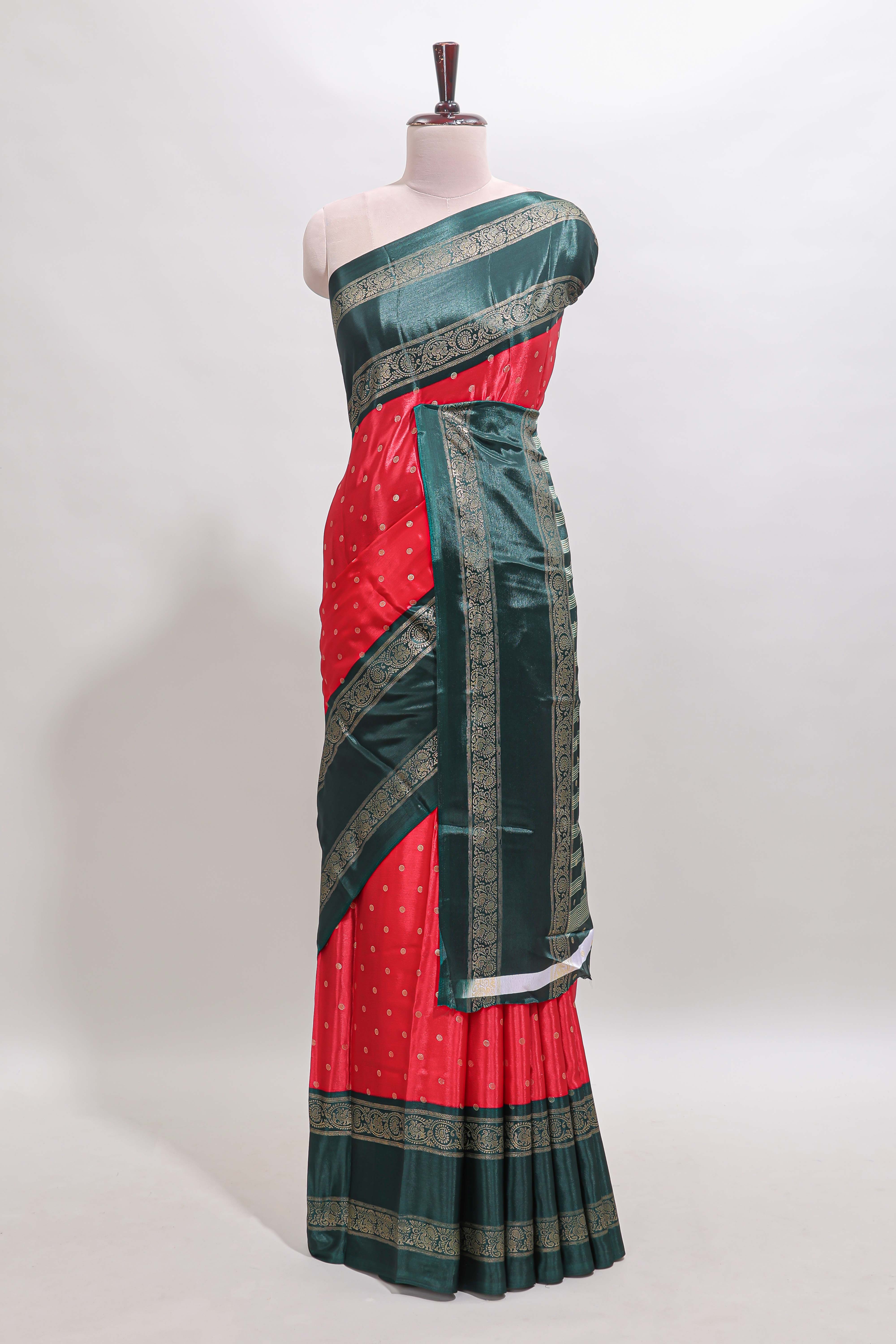 Red zari butta semi soft silk saree with contrast green bentex border and zari striped pallu