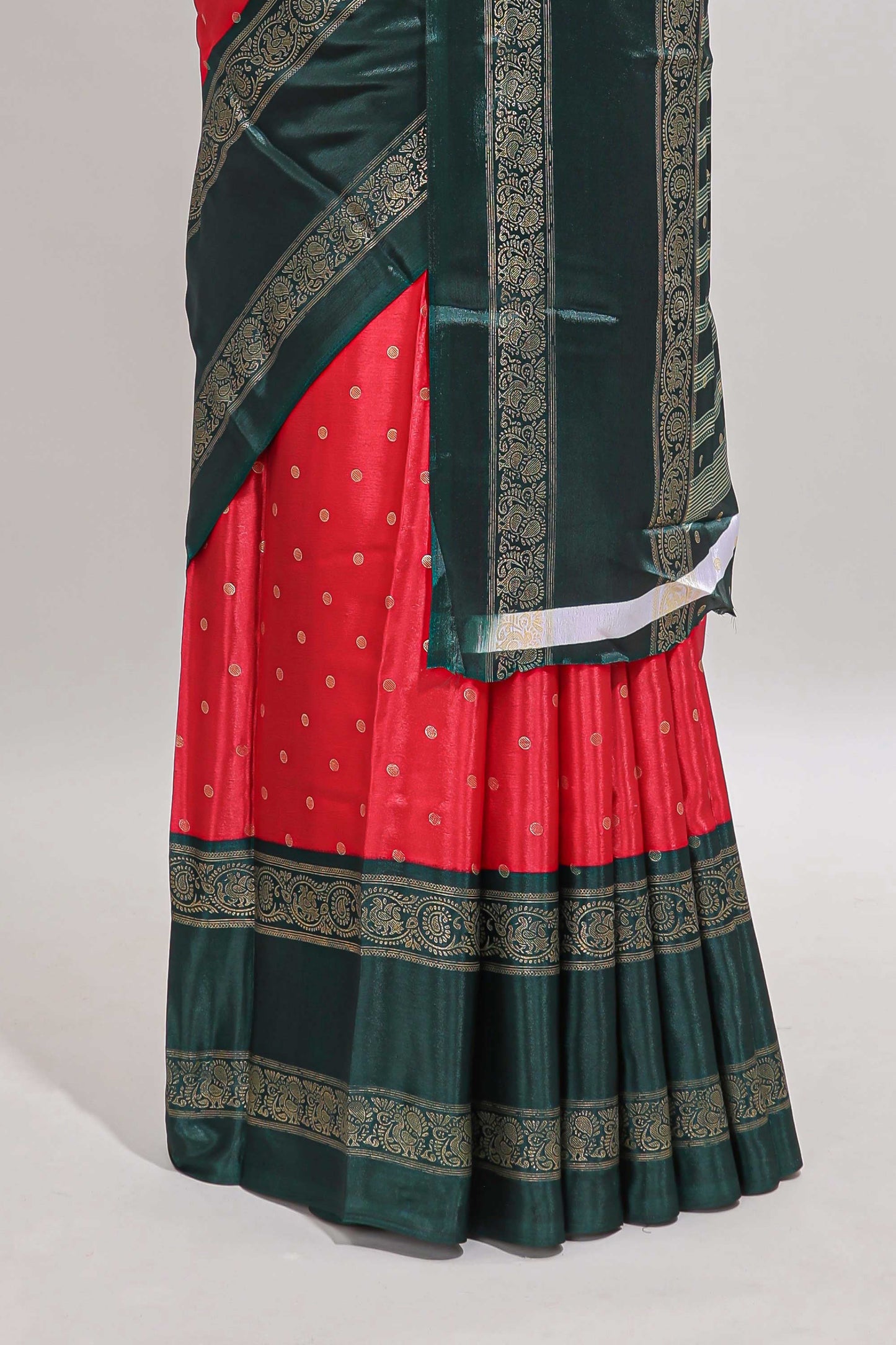 Red zari butta semi soft silk saree with contrast green bentex border and zari striped pallu
