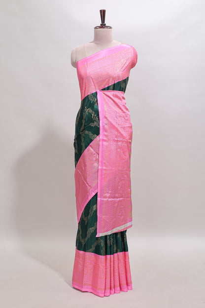 Green floral vine chevron design semi soft silk saree with contrast zari border and striped pallu