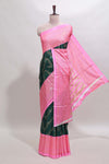 Green floral vine chevron design semi soft silk saree with contrast zari border and striped pallu