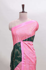 Green floral vine chevron design semi soft silk saree with contrast zari border and striped pallu