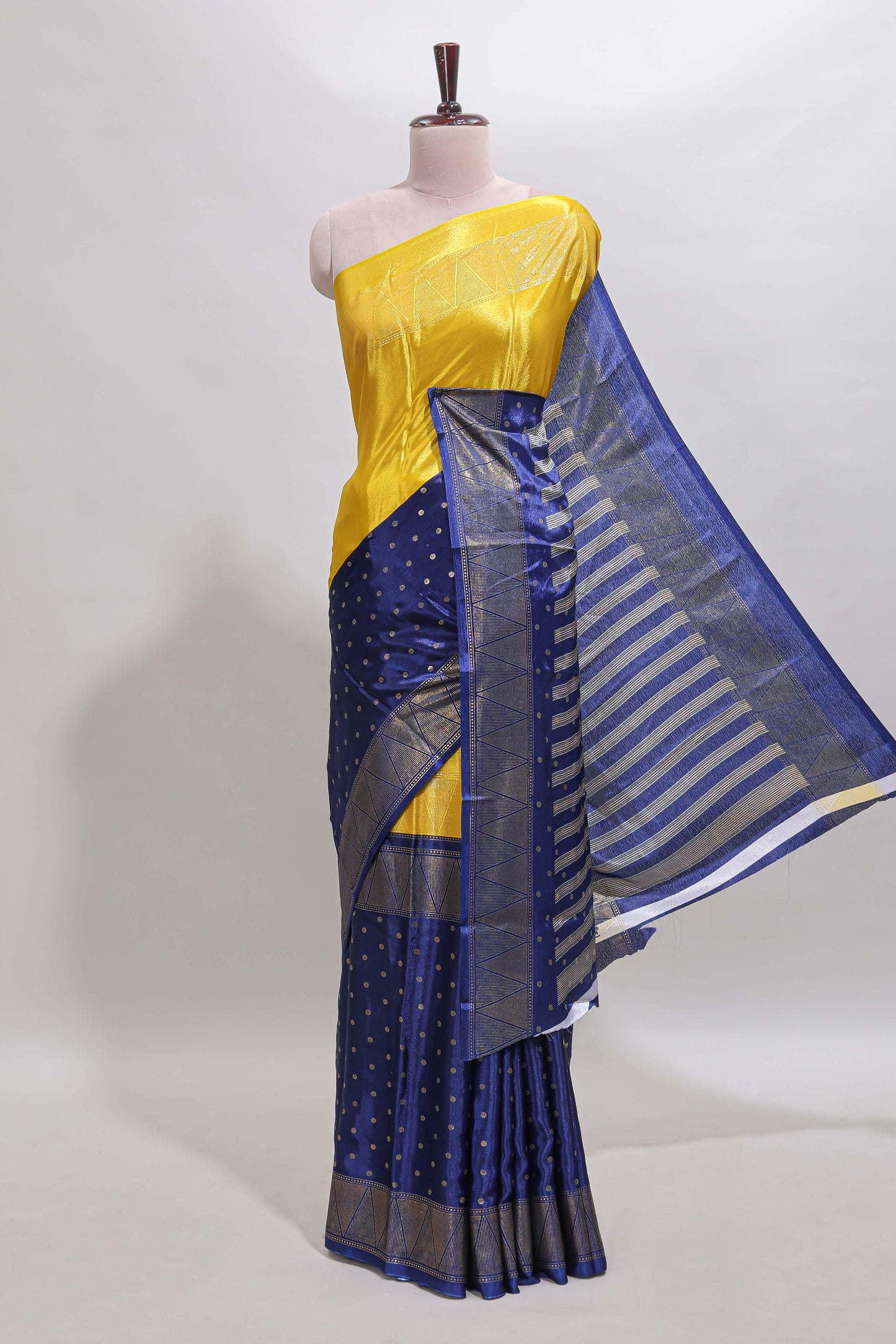 Yellow & blue dual shade zari motifs semi soft silk saree with self border and striped pallu