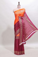 Orange & maroon dual shade zari motifs semi soft silk saree with self border and striped pallu