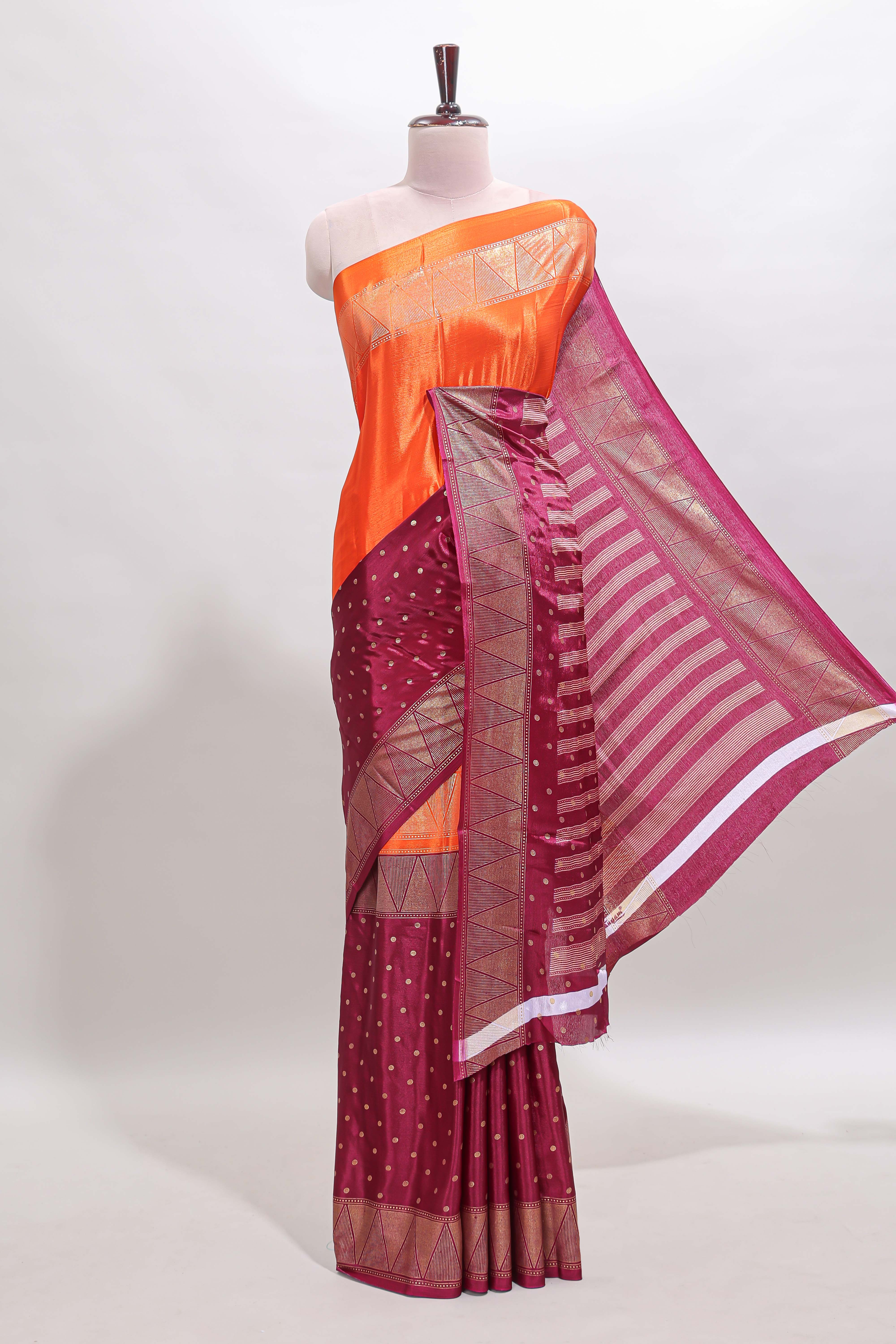 Orange & maroon dual shade zari motifs semi soft silk saree with self border and striped pallu