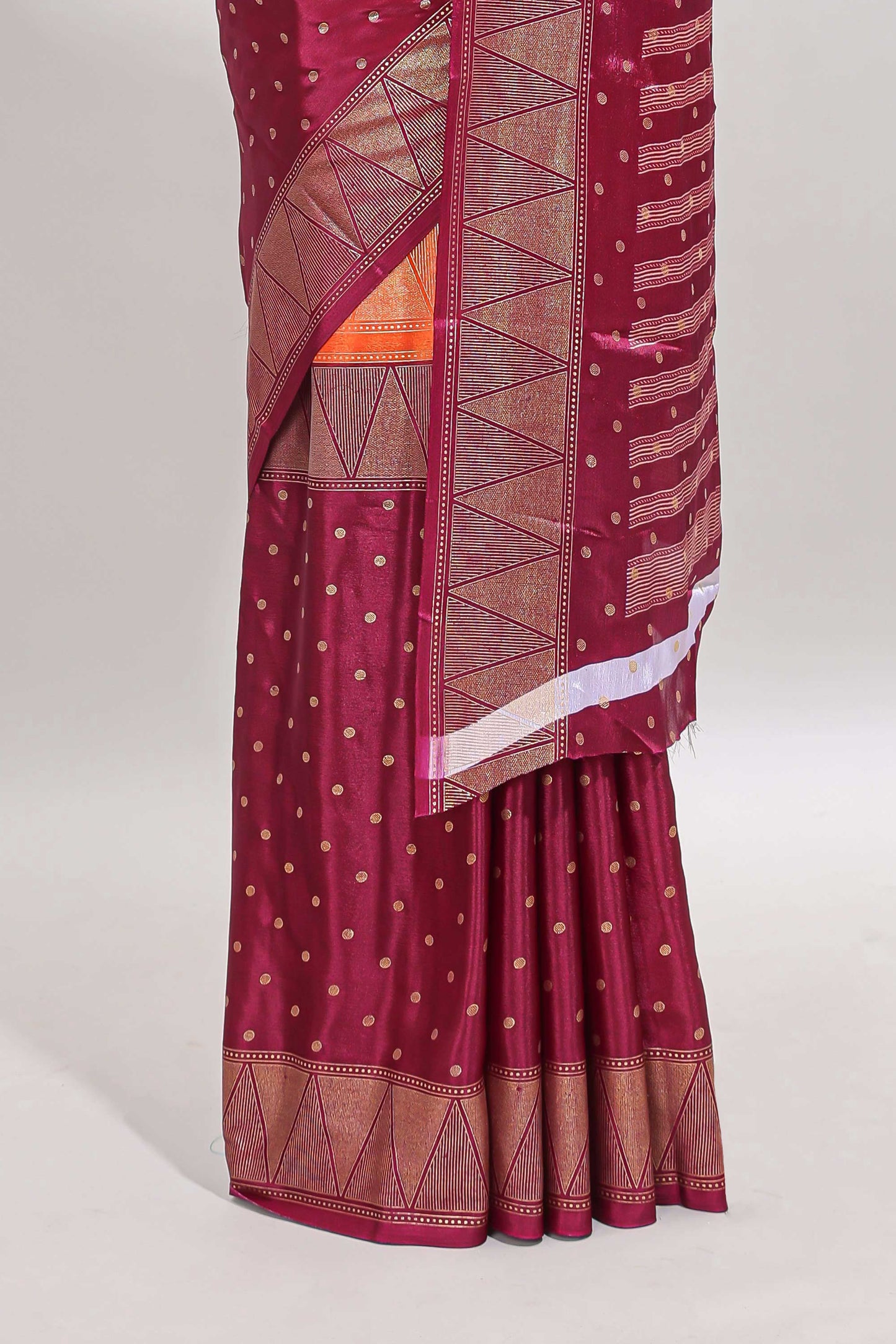 Orange & maroon dual shade zari motifs semi soft silk saree with self border and striped pallu