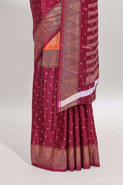 Orange & maroon dual shade zari motifs semi soft silk saree with self border and striped pallu