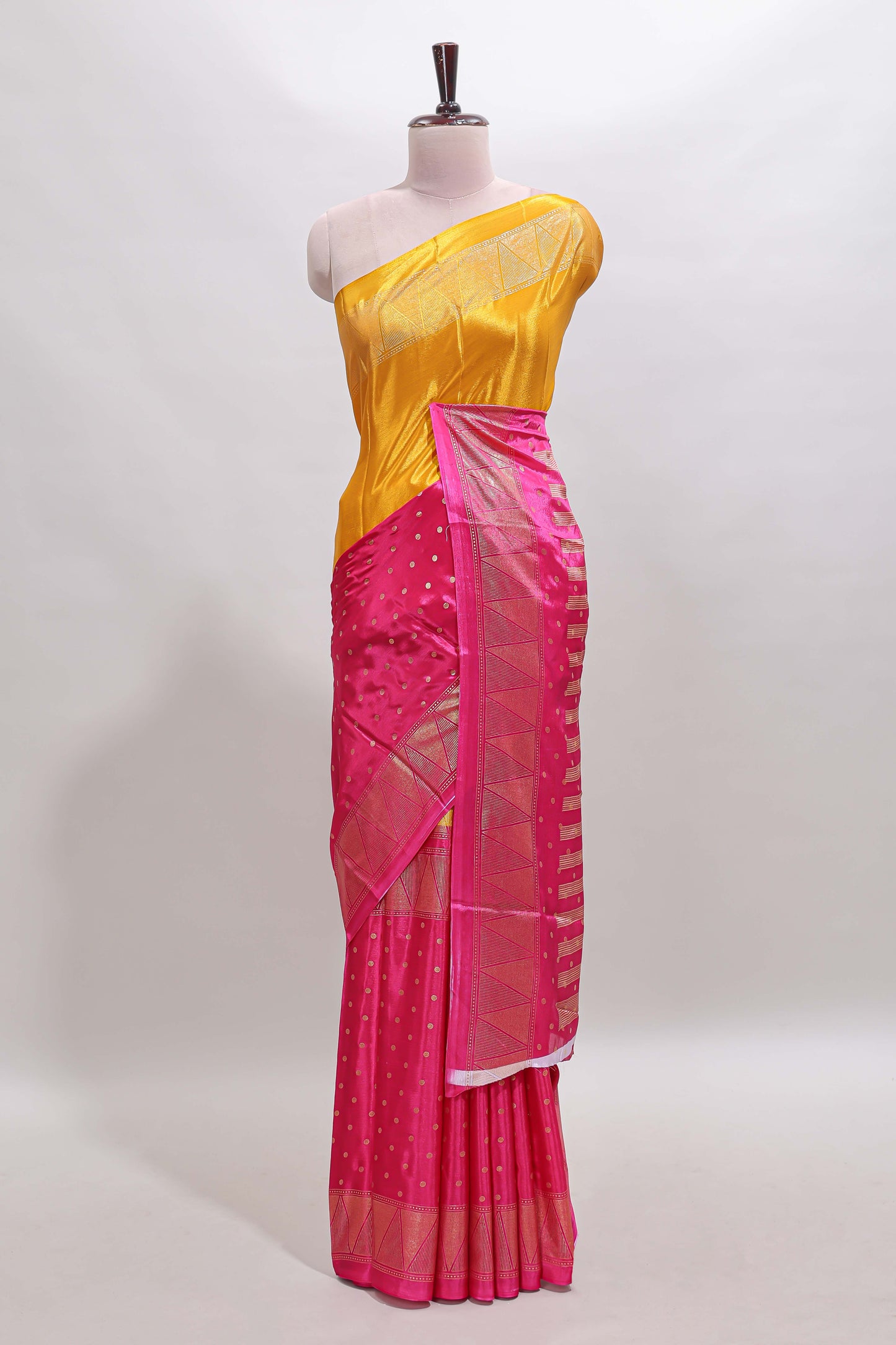 Mustard & pink dual shade zari motifs semi soft silk saree with self border and striped pallu