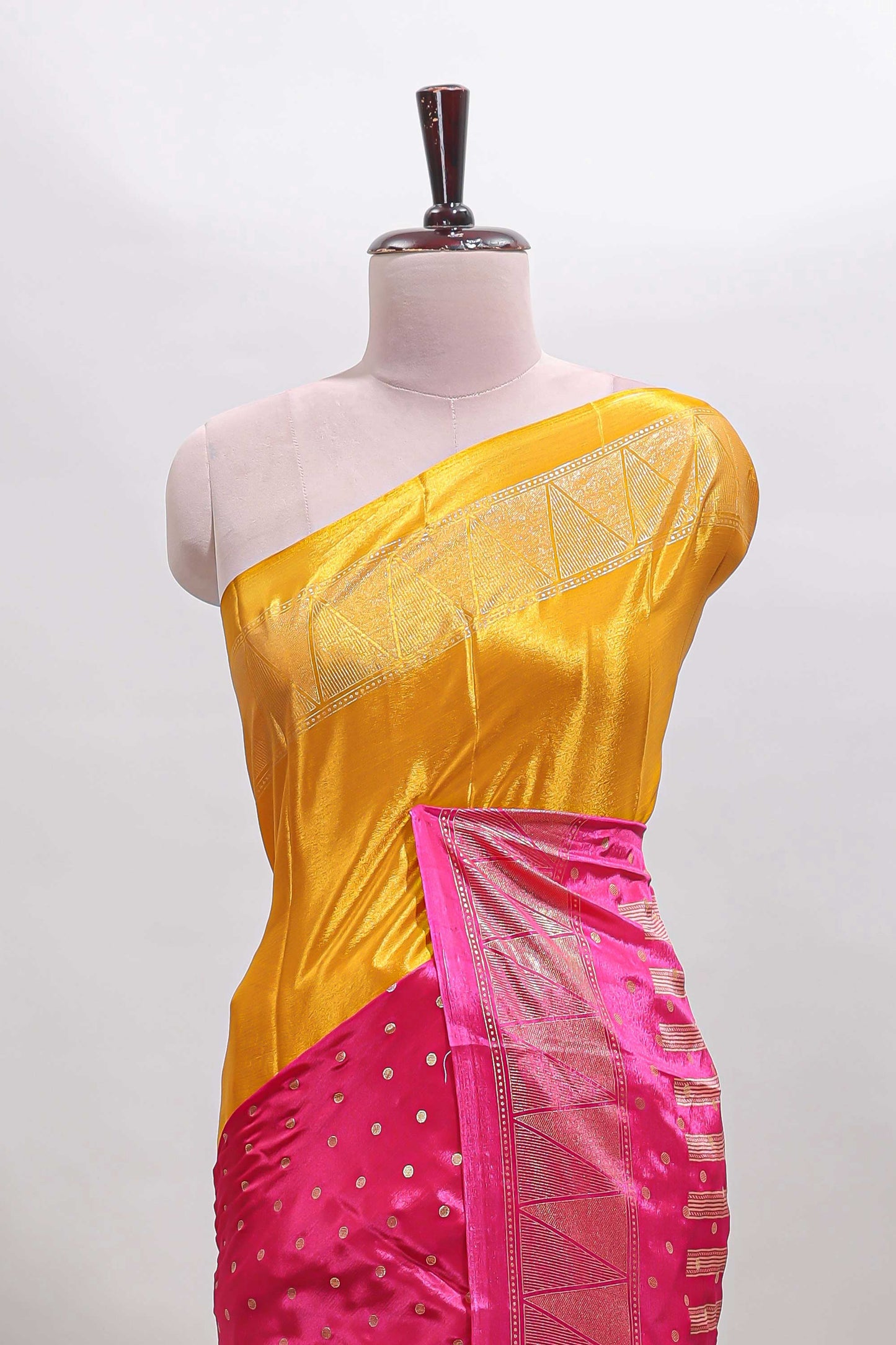 Mustard & pink dual shade zari motifs semi soft silk saree with self border and striped pallu