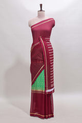 Green zari motifs semi soft silk saree with contrast border and striped pallu