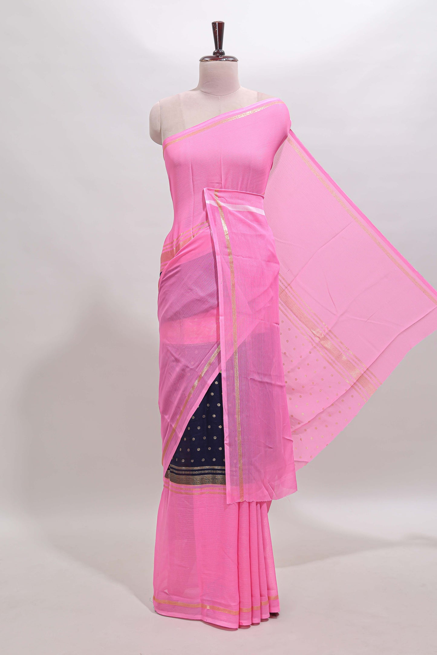 Blue zari motifs semi soft silk saree with contrast border and striped blouse