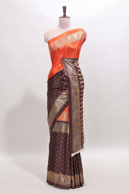 Orange & brown dual shade zari motifs semi soft silk saree with self border and striped pallu