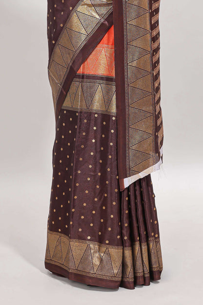 Orange & brown dual shade zari motifs semi soft silk saree with self border and striped pallu