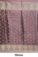 Orange & brown dual shade zari motifs semi soft silk saree with self border and striped pallu