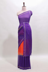 Orange zari motifs semi soft silk saree with contrast border and striped blouse