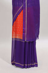 Orange zari motifs semi soft silk saree with contrast border and striped blouse
