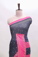 Dark blue checked semi soft silk saree with contrast border and striped pallu
