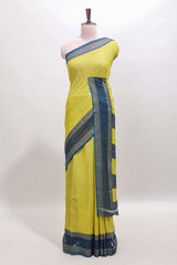Lime green checked zari motifs semi soft silk saree with contrast bentex border and striped pallu