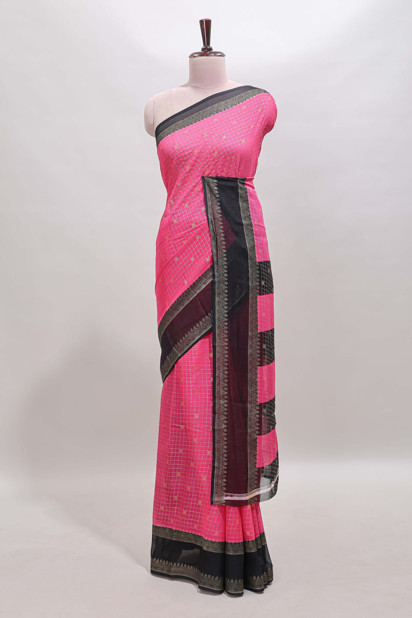 Pink checked zari motifs semi soft silk saree with contrast bentex border and striped pallu