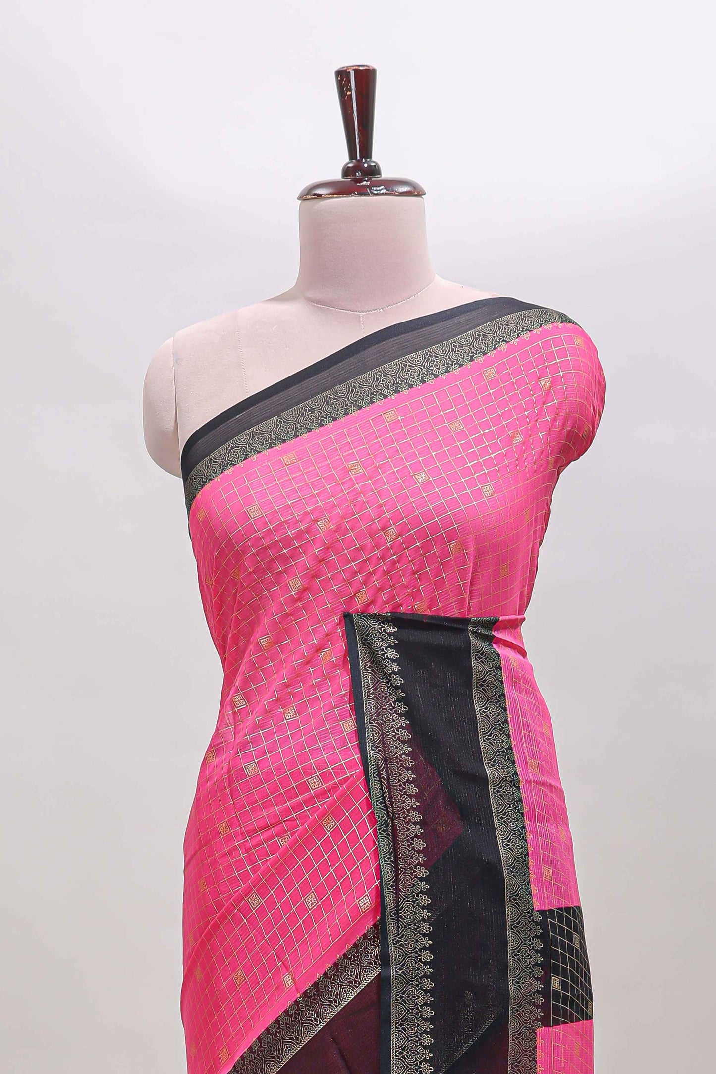 Pink checked zari motifs semi soft silk saree with contrast bentex border and striped pallu